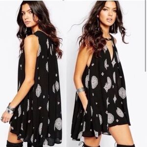 Free People black medallion Snap Out Of It tunic dress. Size XS